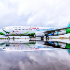 “青春珠海号”主题客机在珠海金湾机场腾空而起飞往北京